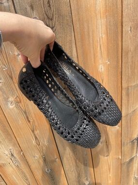 Black woven flats